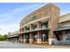 Whole Foods Market brick building with large windows, a covered entrance, and parking at 306 Atley Pl, Alpharetta, GA 30009