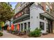Superica restaurant exterior with attractive architecture, outdoor seating, and stylish storefront at 306 Atley Pl, Alpharetta, GA 30009