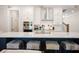 Modern kitchen island with seating, stainless steel appliances, and elegant white cabinetry at 306 Atley Pl, Alpharetta, GA 30009