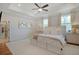 A serene main bedroom featuring tray ceilings, neutral tones, and plush carpeting at 306 Atley Pl, Alpharetta, GA 30009