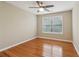 Bedroom with hardwood floors, a ceiling fan, and one window at 4845 Weathervane Dr, Alpharetta, GA 30022