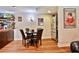 Finished basement area includes a dining table, bar area, and stainless steel refrigerator at 525 Sycamore Pt, Woodstock, GA 30189
