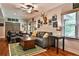 Finished basement with a spacious seating area, decor, and plenty of natural light at 525 Sycamore Pt, Woodstock, GA 30189