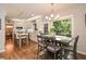 Bright, open kitchen featuring a dining nook and backyard views at 525 Sycamore Pt, Woodstock, GA 30189