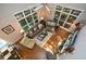 Aerial view of the living room with hardwood floors, natural light, and comfortable seating at 525 Sycamore Pt, Woodstock, GA 30189