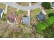 Aerial view of a house and it's landscaped lot in a cul-de-sac at 1145 Prospect Mill Dr, Lawrenceville, GA 30043