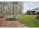Well-maintained backyard with patio and ample greenery, perfect for outdoor enjoyment at 1145 Prospect Mill Dr, Lawrenceville, GA 30043