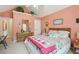 Bedroom with a vaulted ceiling, decor and a dresser at 1145 Prospect Mill Dr, Lawrenceville, GA 30043