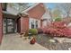 Charming brick home with landscaped front yard and beautiful Japanese Maple at 1145 Prospect Mill Dr, Lawrenceville, GA 30043
