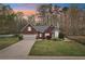 Charming single-story home with well-manicured lawn, complemented by a spacious two-car garage at 1145 Prospect Mill Dr, Lawrenceville, GA 30043