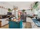 Kitchen with center island, granite countertops, stainless steel appliances, and floral wallpaper at 1145 Prospect Mill Dr, Lawrenceville, GA 30043