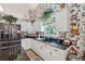Bright kitchen with granite countertops, stainless steel appliances, and custom floral wallpaper at 1145 Prospect Mill Dr, Lawrenceville, GA 30043