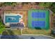 Aerial view of a community pool and tennis court at 2643 Herndon Nw Rd, Lawrenceville, GA 30043
