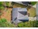 An aerial view of a home showing roof and surrounding landscape at 2643 Herndon Nw Rd, Lawrenceville, GA 30043