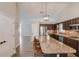 Open-concept kitchen with a large island, stainless steel appliances, and ample counter space, perfect for cooking and entertaining at 2643 Herndon Nw Rd, Lawrenceville, GA 30043