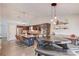 Spacious kitchen with stainless steel appliances, granite countertops, and an island with seating for a modern and functional design at 2643 Herndon Nw Rd, Lawrenceville, GA 30043