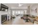 Inviting living room with a fireplace, a vaulted ceiling, and lots of natural light at 2643 Herndon Nw Rd, Lawrenceville, GA 30043