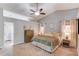 Cozy main bedroom with a vaulted ceiling, soft carpeting, and en-suite bathroom, creating a private and relaxing retreat at 2643 Herndon Nw Rd, Lawrenceville, GA 30043