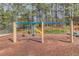 Community playground includes swings and a slide for residents at 2643 Herndon Nw Rd, Lawrenceville, GA 30043