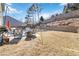 Backyard with patio, outdoor furniture, grill, terraced landscaping, and string lights at 416 Pine Log Ct, Canton, GA 30115