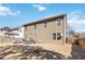 Spacious backyard features a patio area with outdoor furniture and lawn at 416 Pine Log Ct, Canton, GA 30115
