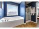 Relaxing bathroom with soaking tub and separate shower at 416 Pine Log Ct, Canton, GA 30115