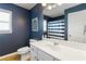 Bathroom with vanity, mirror, and commode at 416 Pine Log Ct, Canton, GA 30115