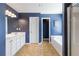 Ensuite bathroom featuring double vanity, soaking tub, shower, and tile floors at 416 Pine Log Ct, Canton, GA 30115