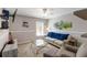 Cozy living room featuring a comfortable couch, loveseat and entertainment center at 416 Pine Log Ct, Canton, GA 30115