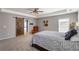The main bedroom has a barn door that leads to the ensuite bathroom at 416 Pine Log Ct, Canton, GA 30115