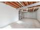 Unfinished basement with concrete floor and exposed ceiling, ready for customization at 508 Sutters Mill Rd, Stone Mountain, GA 30087