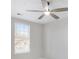 Bedroom featuring large windows providing natural light, and a ceiling fan at 508 Sutters Mill Rd, Stone Mountain, GA 30087