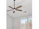 Bedroom with fan and view at 508 Sutters Mill Rd, Stone Mountain, GA 30087