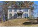 Attractive two-story home featuring a symmetrical facade and a well-maintained front lawn at 508 Sutters Mill Rd, Stone Mountain, GA 30087