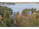 Breathtaking aerial view of the lake, home, and surroundings at 5500 Mccoy Nw Rd # 15, Acworth, GA 30101