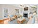 Cozy living room featuring a fireplace, built-in shelves, and comfortable seating at 5500 Mccoy Nw Rd # 15, Acworth, GA 30101