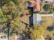 Aerial view of a charming single-Gathering home with a well-maintained yard and mature trees at 2742 Oakland Ter, Decatur, GA 30032