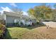 Charming backyard features a well-maintained lawn, a patio and easy access into the house at 2742 Oakland Ter, Decatur, GA 30032