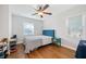 Bright bedroom featuring hardwood floors, natural light, and a comfortable bed at 2742 Oakland Ter, Decatur, GA 30032