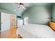 Spacious bedroom with vaulted ceiling, ceiling fan, and ensuite bathroom at 2742 Oakland Ter, Decatur, GA 30032
