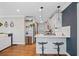 Well-appointed kitchen featuring stainless steel appliances, white cabinetry, and a breakfast bar at 2742 Oakland Ter, Decatur, GA 30032