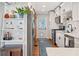 Bright kitchen with stainless steel appliances, white cabinets, and hardwood floors at 2742 Oakland Ter, Decatur, GA 30032