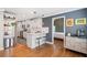 Modern kitchen with stainless steel appliances, a breakfast bar, and hardwood floors at 2742 Oakland Ter, Decatur, GA 30032