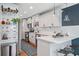 Charming kitchen with a breakfast bar, stainless steel appliances, and stylish decor at 2742 Oakland Ter, Decatur, GA 30032