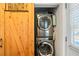 Convenient laundry area with stackable washer and dryer, maximizing space and efficiency at 2742 Oakland Ter, Decatur, GA 30032