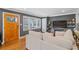 Cozy living room featuring hardwood floors, large windows, and comfortable furniture at 2742 Oakland Ter, Decatur, GA 30032