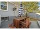 Cozy outdoor patio with stylish table and chairs, perfect for enjoying meals and relaxing in the backyard space at 2742 Oakland Ter, Decatur, GA 30032