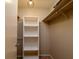 Walk-in closet with shelving unit and a light fixture at 408 Smokerise Se Cir, Marietta, GA 30067