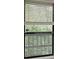 Window with blinds offering natural light and ventilation at 408 Smokerise Se Cir, Marietta, GA 30067
