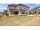 Large backyard with a covered patio and outdoor basketball court at 4405 Croftshire Pl, Cumming, GA 30040
